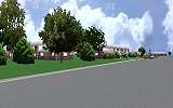 The Jeffrey MacDonald Case: CJ000220.JPG: Representation of view facing northeast down Castle Drive. The MacDonald apartment is approximately in front of and to the right of the red car.