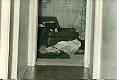 East window in east bedroom, with body of Colette MacDonald on floor