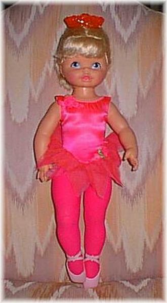 Dancerina doll, by Mattel. Intruduced in 1968. 24" tall. Pirouettes via activation of a knob in the plastic crown; turns in either direction and can also dance in place on tip-toe. This doll came with a plastic record with dance music to be played on a regular record play (33 1/3 rpm).