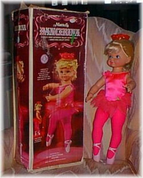 Dancerina doll, by Mattel. Intruduced in 1968. 24" tall. Pirouettes via activation of a knob in the plastic crown; turns in either direction and can also dance in place on tip-toe. This doll came with a plastic record with dance music to be played on a regular record play (33 1/3 rpm).